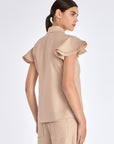 Elegant back view of the Clark Blouse in Nude.