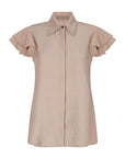 The Clark Blouse in a sophisticated Nude, featuring its crisp shirt collar and hidden button placket.