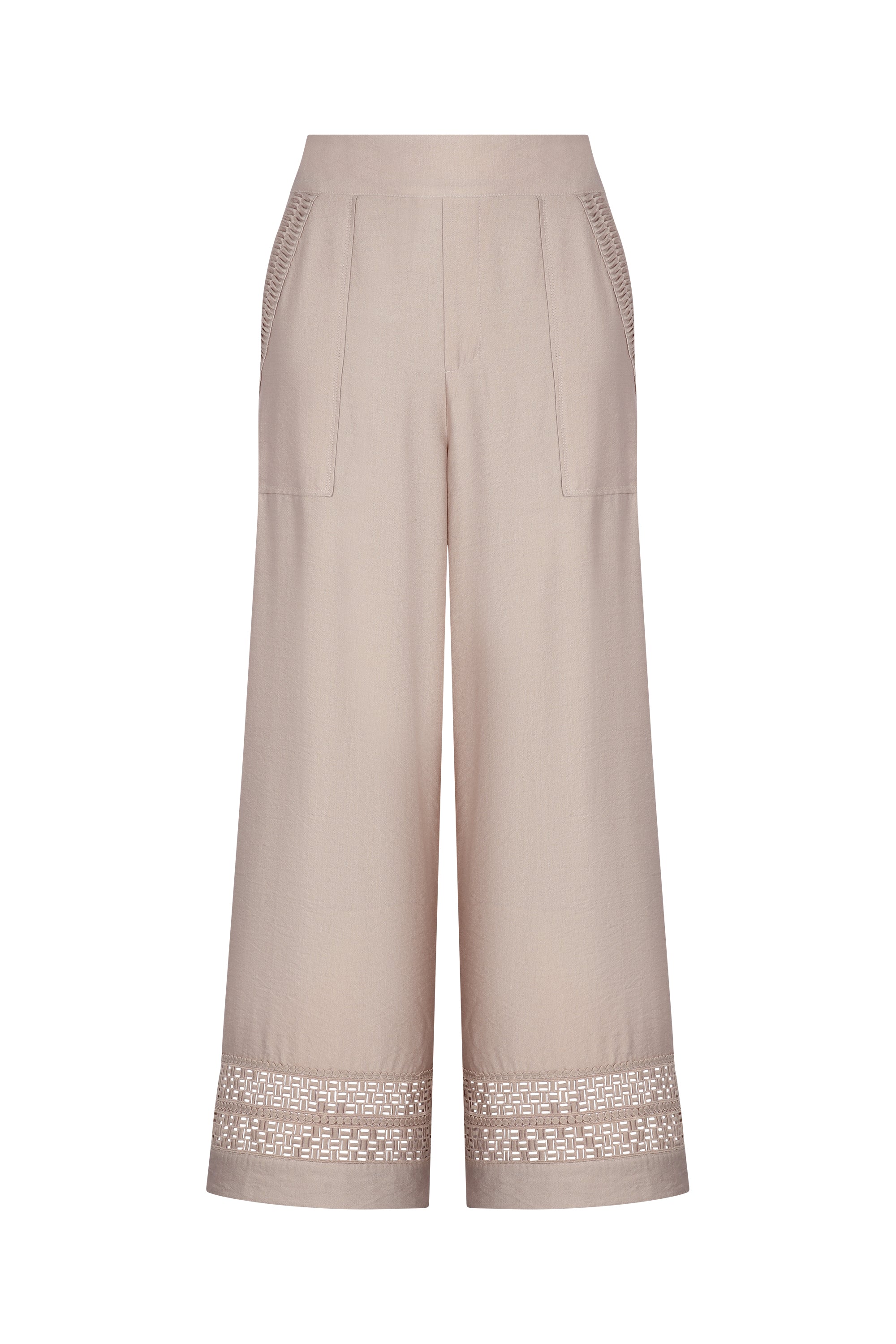 Model wearing the nude Clark Ease Pant, a soft knit trouser with an elastic waist.