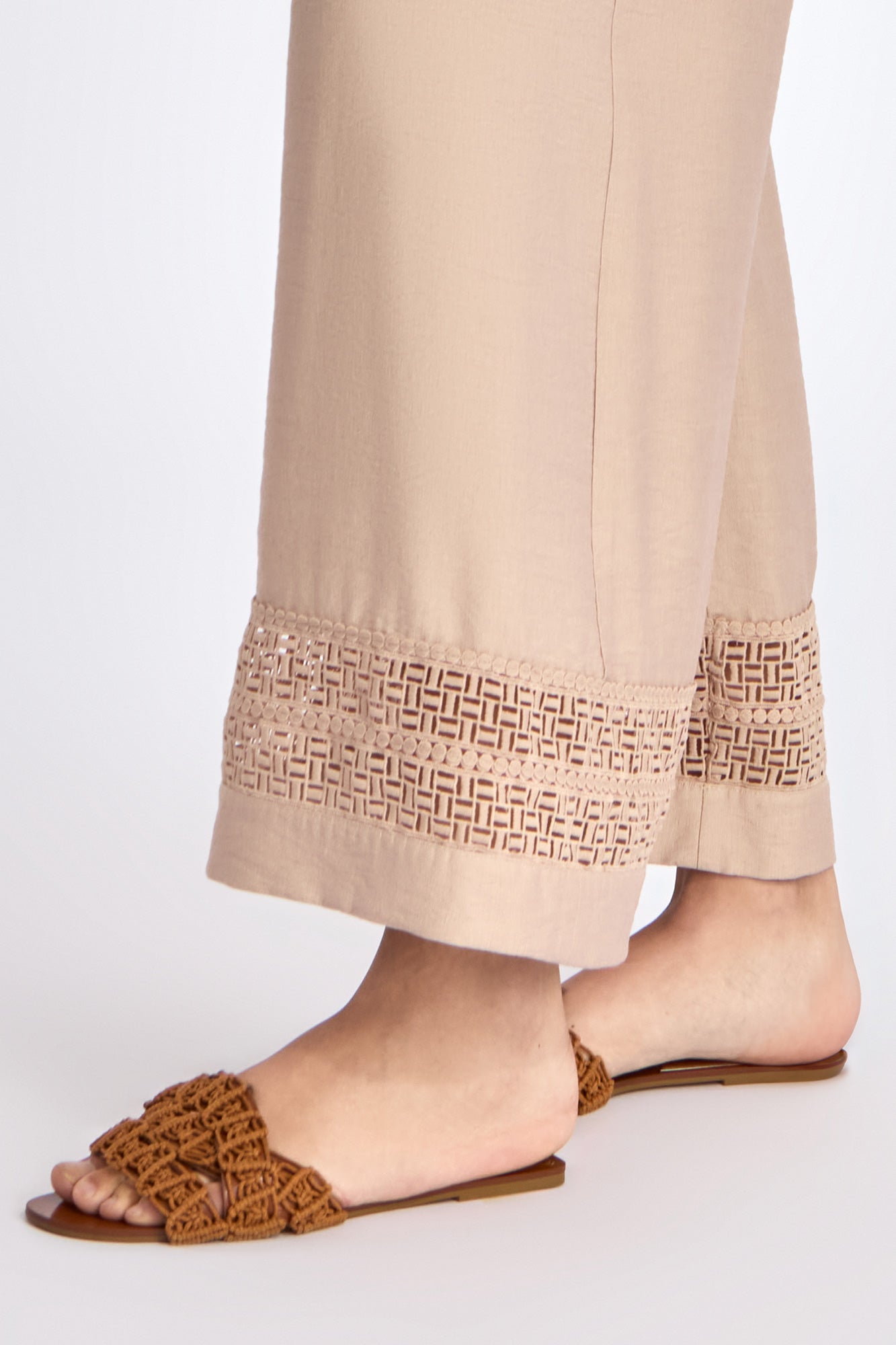 Close-up of the architectural diagonal pocket on the Nude Clark Ease Pant.