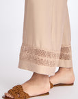 Close-up of the architectural diagonal pocket on the Nude Clark Ease Pant.
