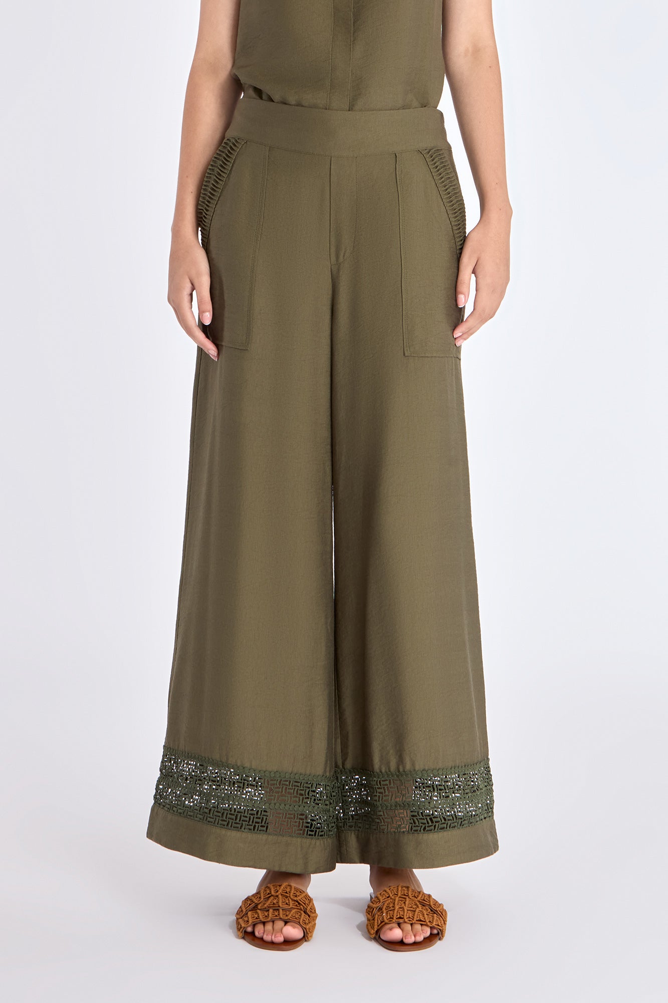 Front view of the Clark Ease Pant in olive, showcasing its soft knit fabric and relaxed fit.