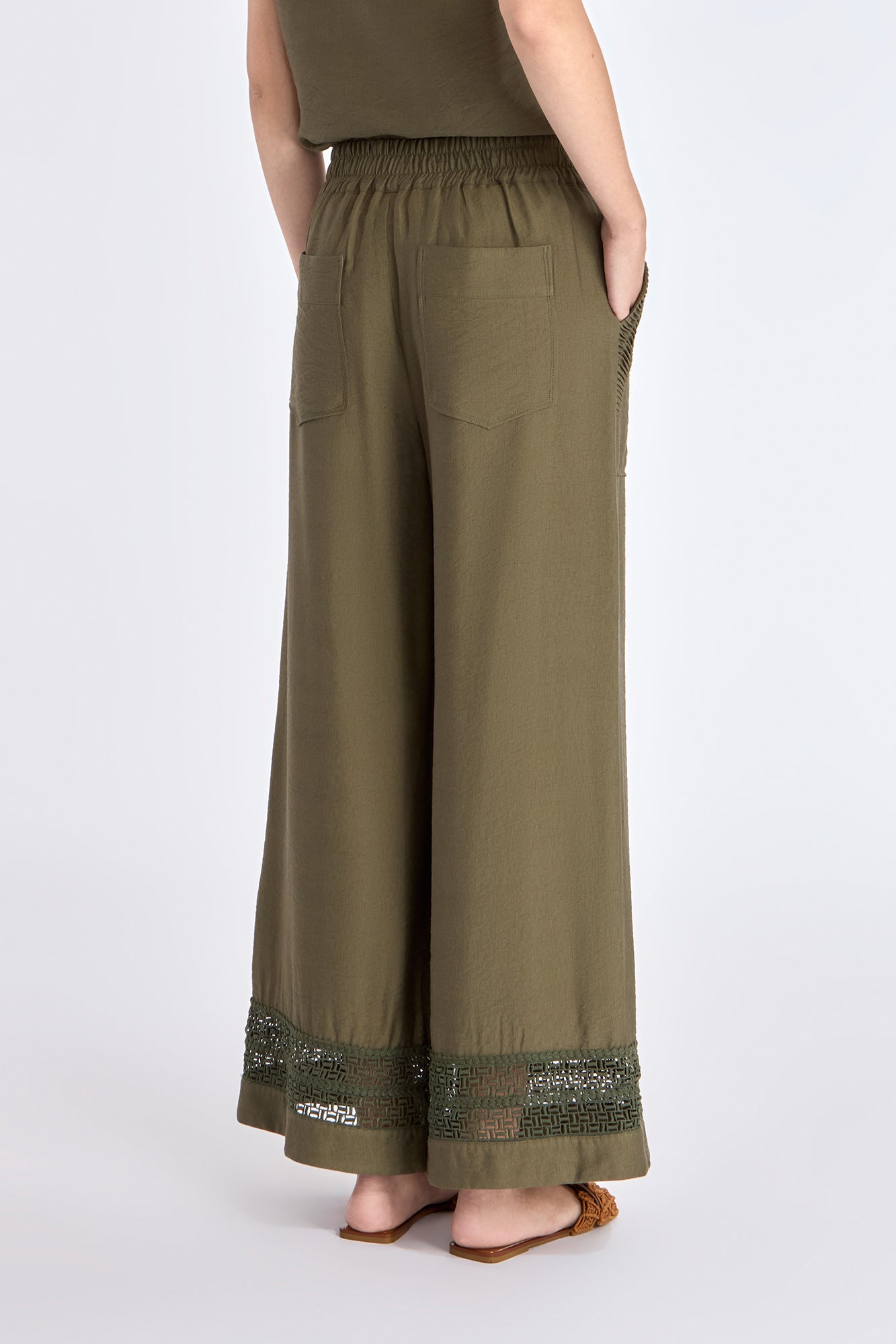 Clean back silhouette of the Clark Ease Pant, showing the seamless waistband.