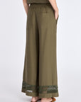 Clean back silhouette of the Clark Ease Pant, showing the seamless waistband.