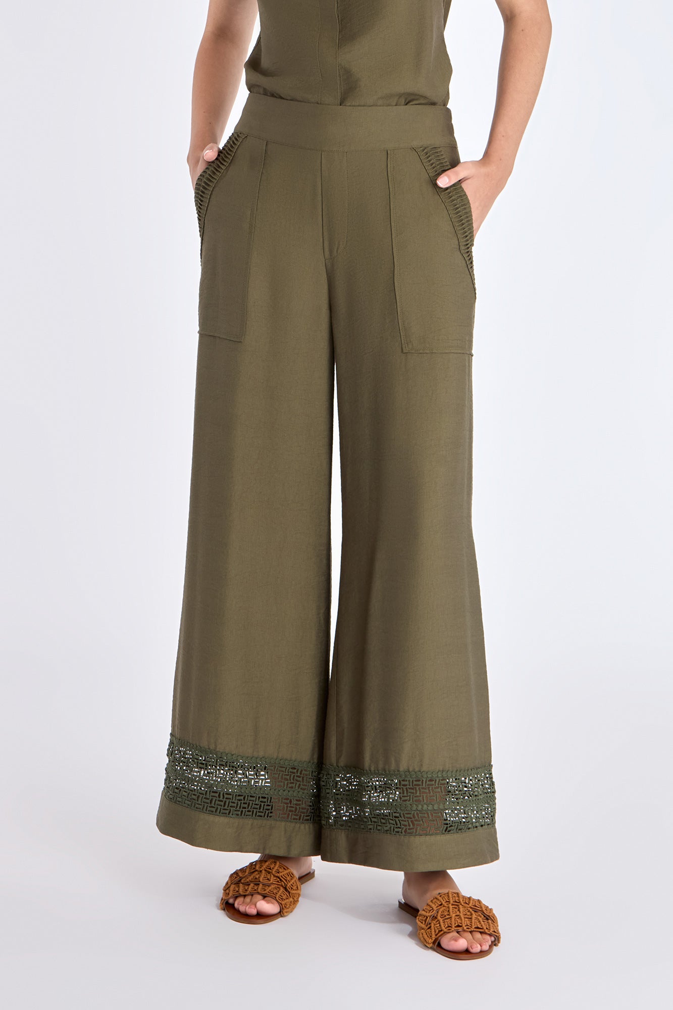Front view of the Clark Ease Pant in olive, showcasing its soft knit fabric and relaxed fit.