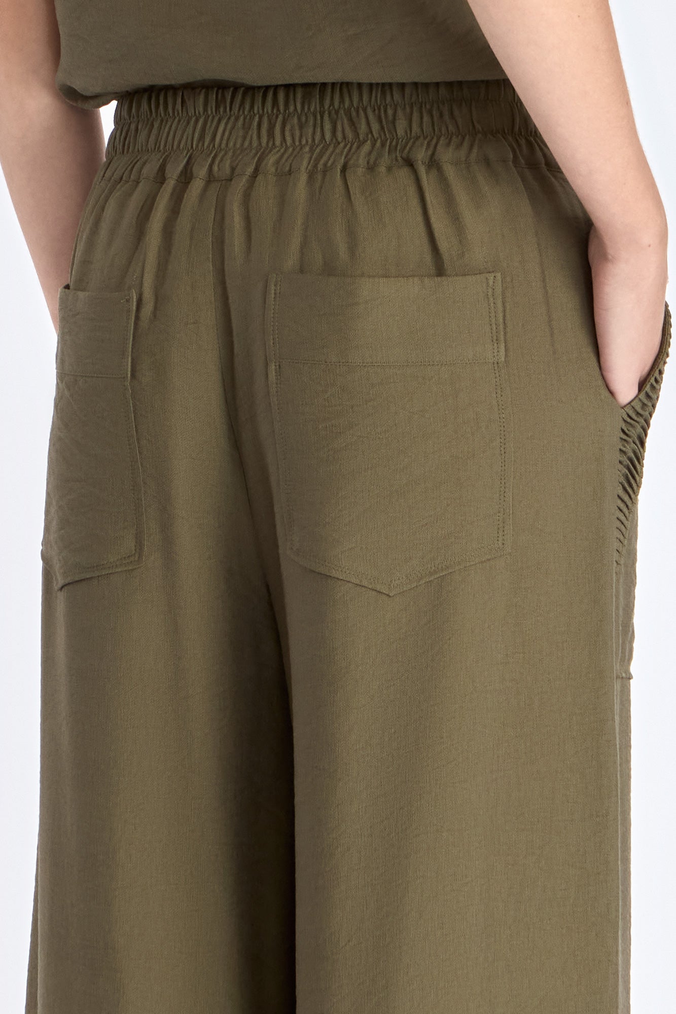 Clean back silhouette of the Clark Ease Pant, showing the seamless waistband.