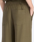 Clean back silhouette of the Clark Ease Pant, showing the seamless waistband.