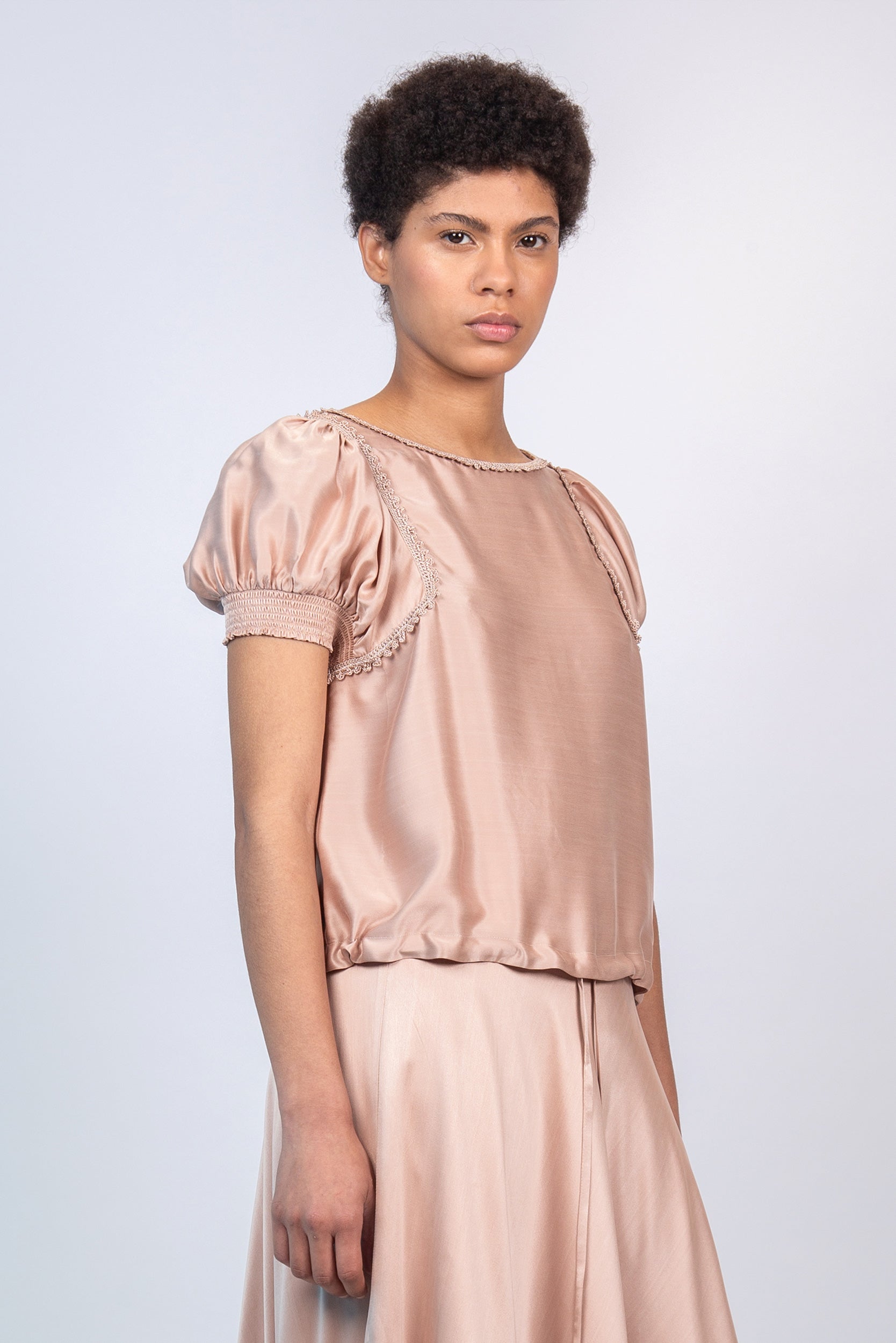 Davina silk top in blush with crochet ribbon accents and adjustable hem