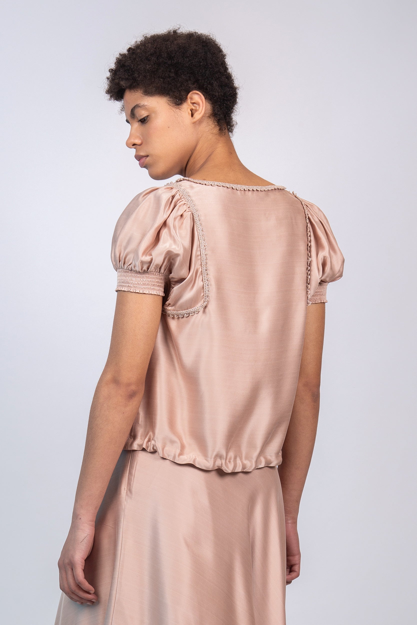 Davina silk top in blush with crochet ribbon accents and adjustable hem