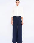 Front view of the Daysi Trouser in Ecru, showcasing its fluid wide-leg silhouette.