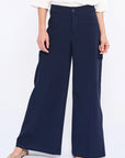 Front view of the Daysi Trouser in Ecru, showcasing its fluid wide-leg silhouette.