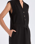Front view of the Denver Dress in black, showcasing its Nehru collar and artisan-embroidered hem.