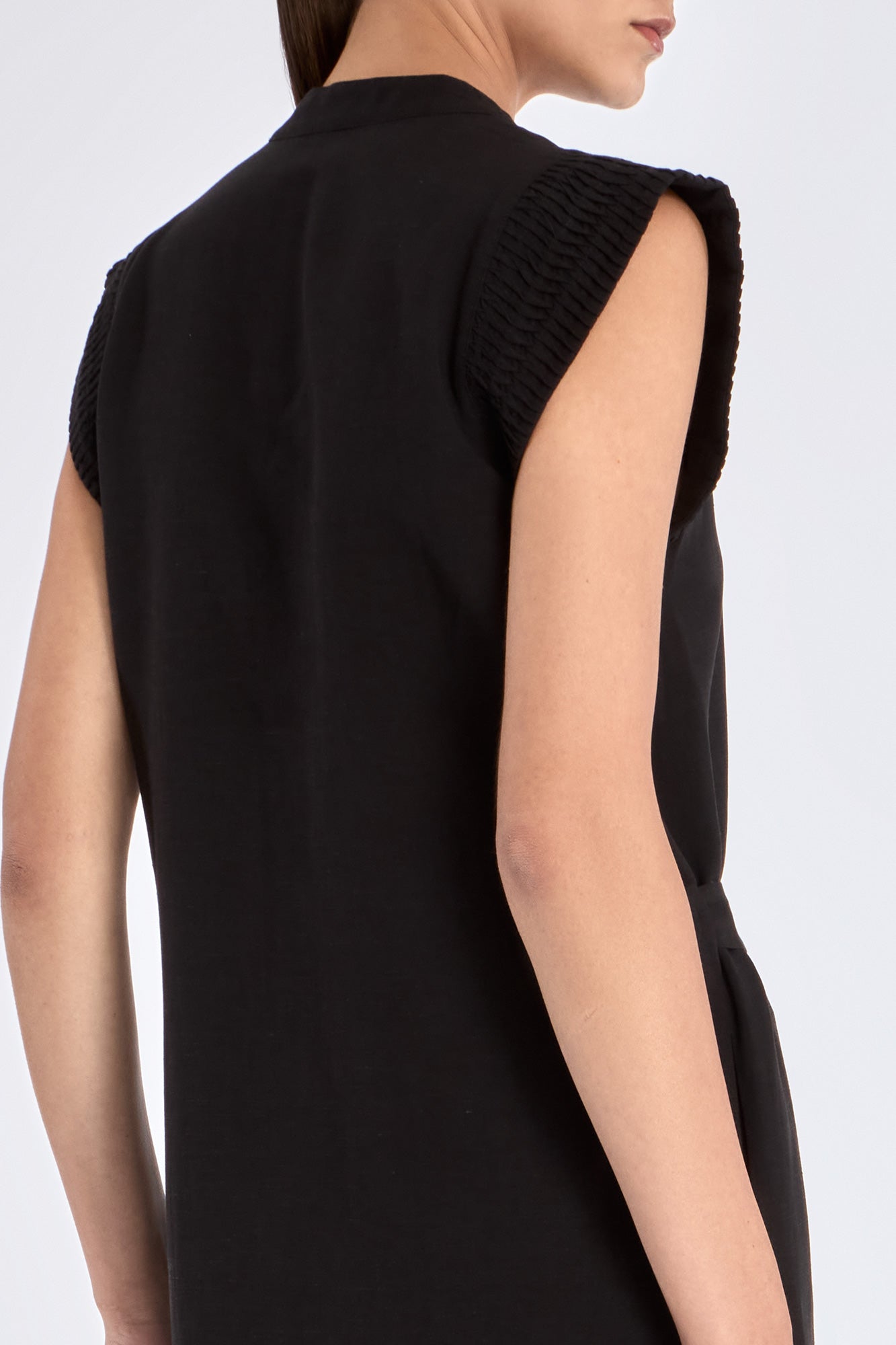 Elegant back view of the Denver Dress, showing the clean lines of its midi silhouette.