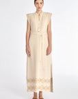 Denver Dress in Ecru – Sleeveless linen midi dress with embroidered hem by AMEDBAM, metal buttons, and fabric belt.