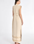 Denver Dress in Ecru – Sleeveless linen midi dress with embroidered hem by AMEDBAM, metal buttons, and fabric belt.