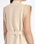 Denver Dress in Ecru – Sleeveless linen midi dress with embroidered hem by AMEDBAM, metal buttons, and fabric belt.