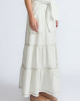 Eden Skirt in Silver – Cotton midi skirt with ruffled hem, patch pockets, and elasticized waistband at the back.