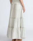 Eden Skirt in Silver – Cotton midi skirt with ruffled hem, patch pockets, and elasticized waistband at the back.
