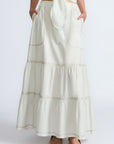Eden Skirt in Silver – Cotton midi skirt with ruffled hem, patch pockets, and elasticized waistband at the back.