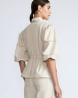Evangeline Blouse in Prestine – 100% cotton blouse with internal belt, decorative trim, shirt collar, and ¾ sleeves with elastic cuffs.
