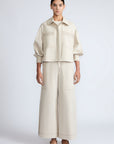 Gwen Jacket in Prestine – Elegant cropped cotton jacket with patch pockets and front pleats for added structure.