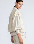 Gwen Jacket in Prestine – Elegant cropped cotton jacket with patch pockets and front pleats for added structure.