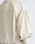 Gwen Jacket in Prestine – Elegant cropped cotton jacket with patch pockets and front pleats for added structure.