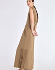 Side profile of the Taupe Indigo Skirt, highlighting the clean silhouette and subtle side slit detail.