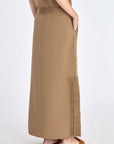 Back view of the Indigo Skirt, showcasing the smooth fit of the half-elasticated waistband.