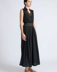 Isidora Dress in Black – Sleeveless midi cotton dress with shirt collar V-neckline, tiered silhouette, and hidden side pockets.