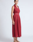 Isidora Dress in Wine – Sleeveless cotton maxi dress with shirt collar, V-neckline, hidden pockets, and tiered silhouette.