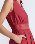 Isidora Dress in Wine – Sleeveless cotton maxi dress with shirt collar, V-neckline, hidden pockets, and tiered silhouette.