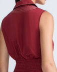 Isidora Dress in Wine – Sleeveless cotton maxi dress with shirt collar, V-neckline, hidden pockets, and tiered silhouette.