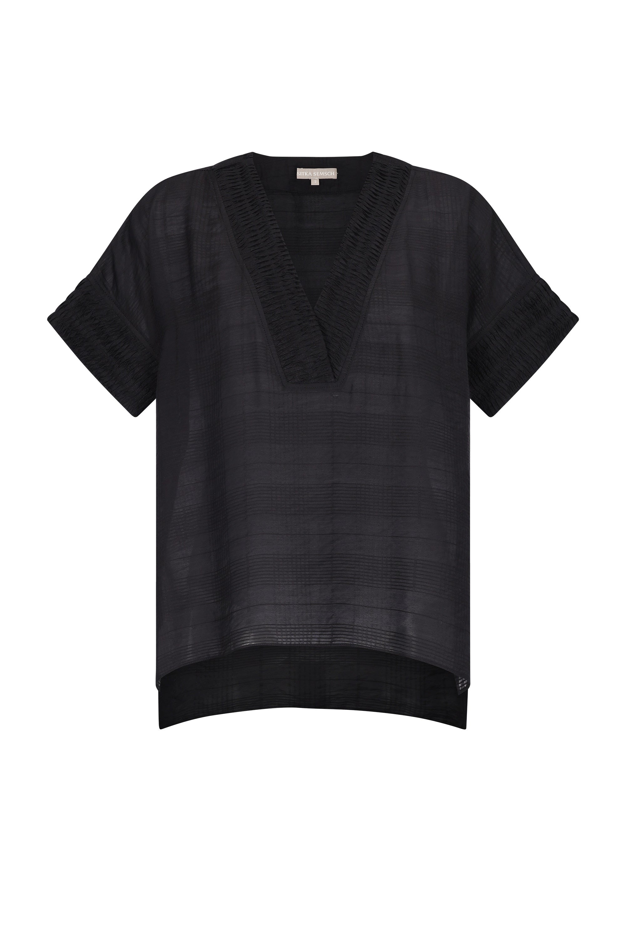 Front view of the Ivy Blouse in black, showcasing its classic V-neckline and relaxed silhouette.