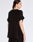 Clean back silhouette of the essential black Ivy Blouse.