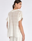 Elegant back view of the Ivy Blouse in Off White.