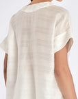 Elegant back view of the Ivy Blouse in Off White.