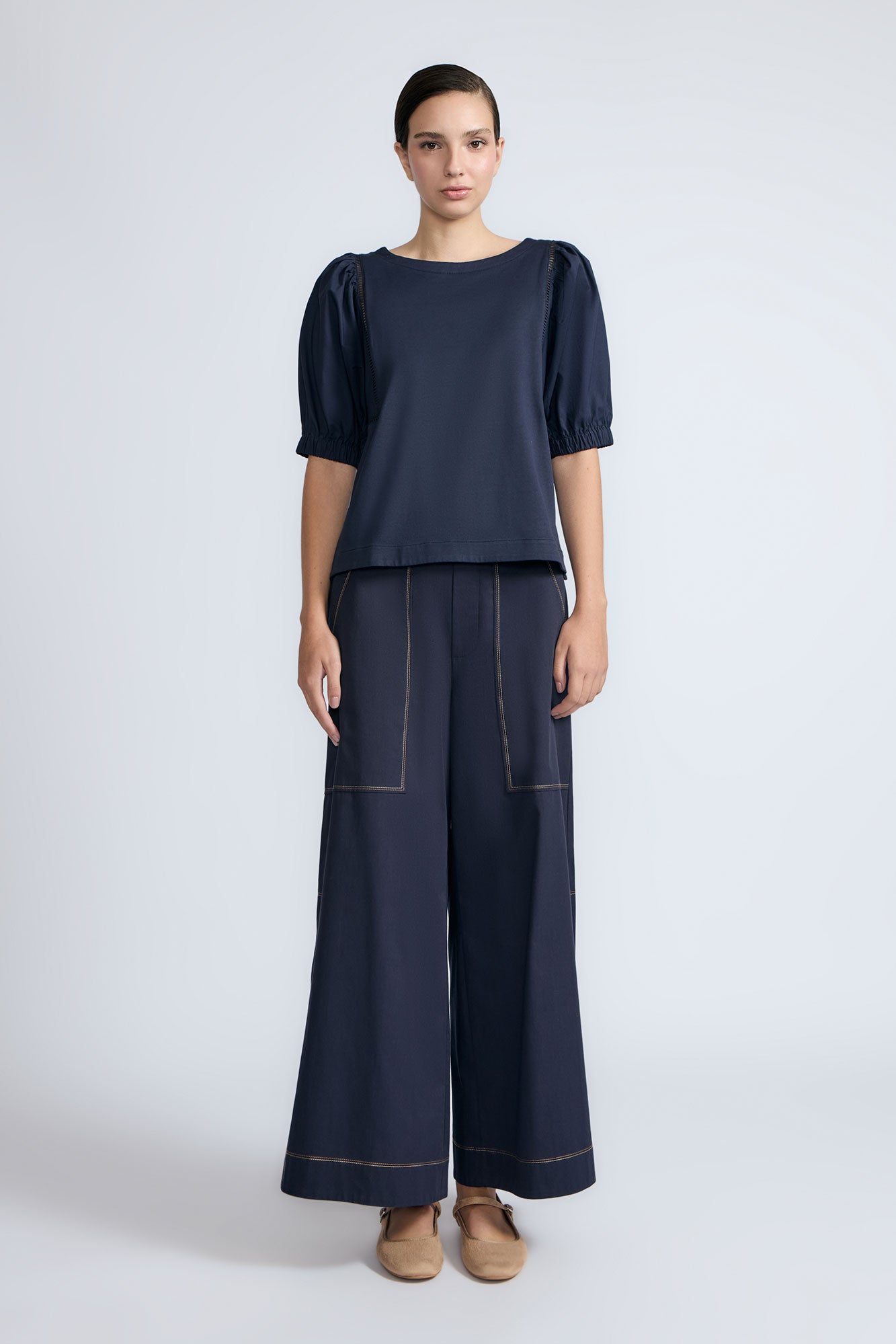 Jamie Top in Navy – 100% cotton top with textured fabric, round neckline, and ¾ sleeves with elastic cuffs.