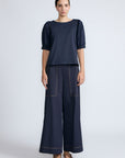 Jamie Top in Navy – 100% cotton top with textured fabric, round neckline, and ¾ sleeves with elastic cuffs.