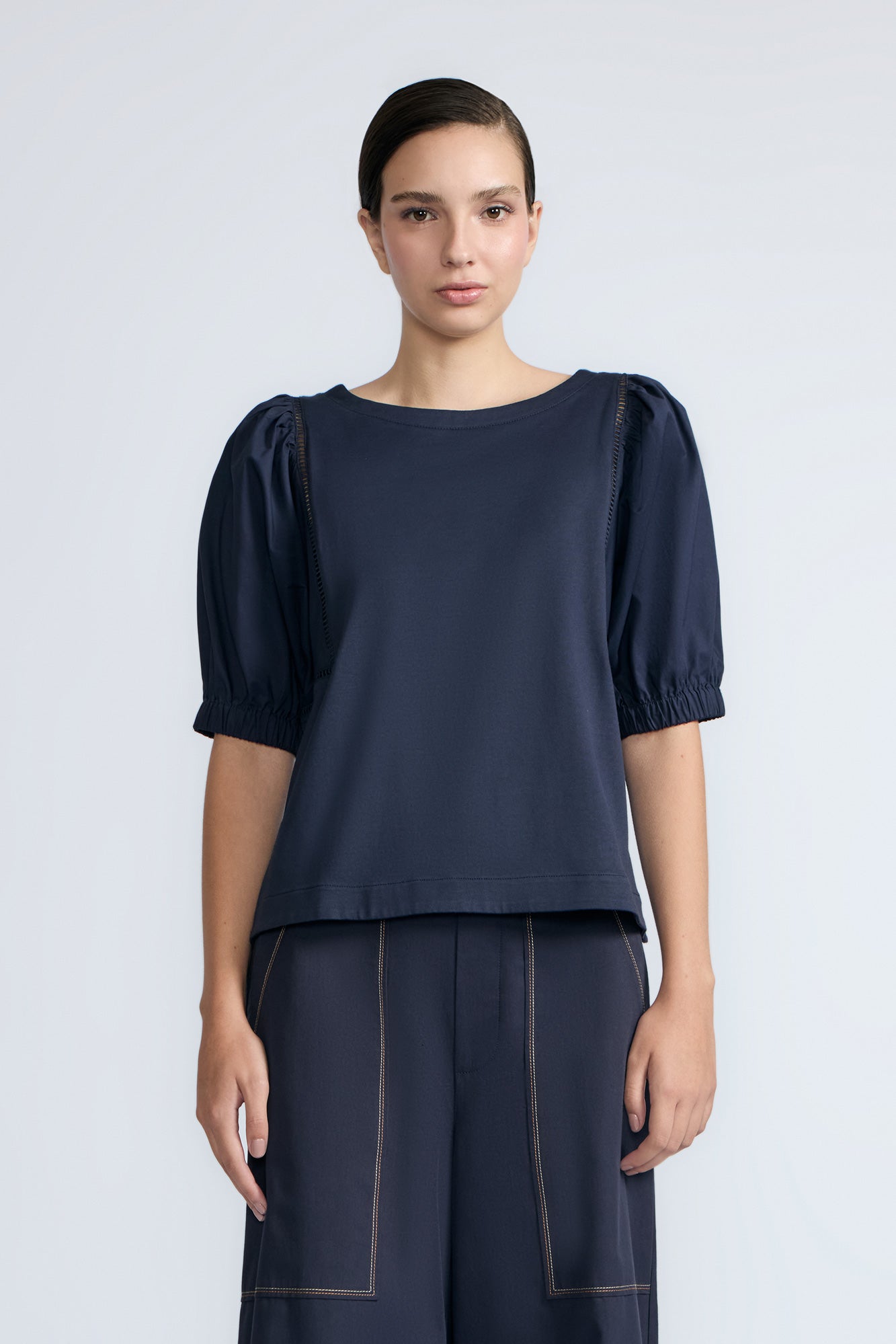 Jamie Top in Navy – 100% cotton top with textured fabric, round neckline, and ¾ sleeves with elastic cuffs.