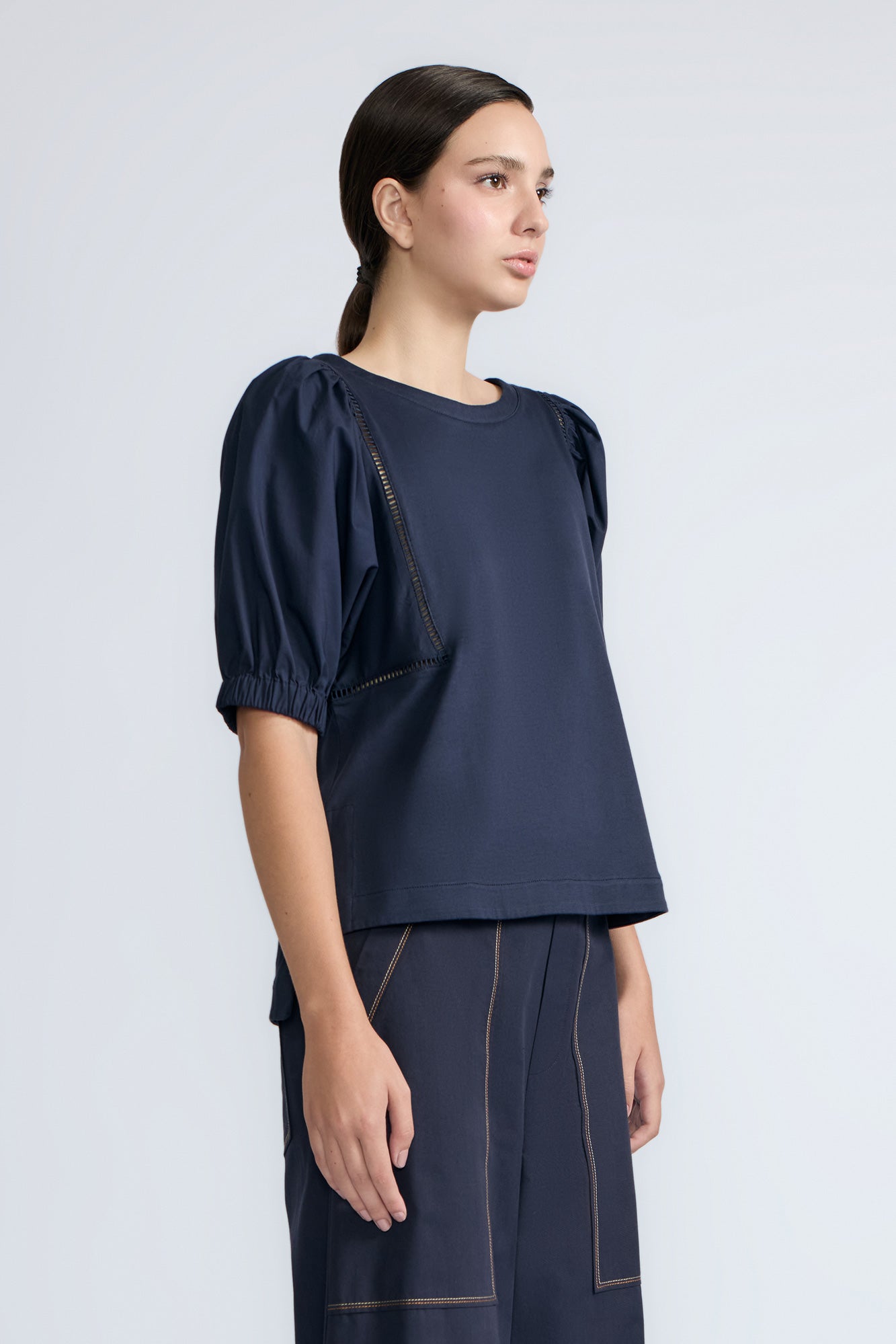 Jamie Top in Navy – 100% cotton top with textured fabric, round neckline, and ¾ sleeves with elastic cuffs.