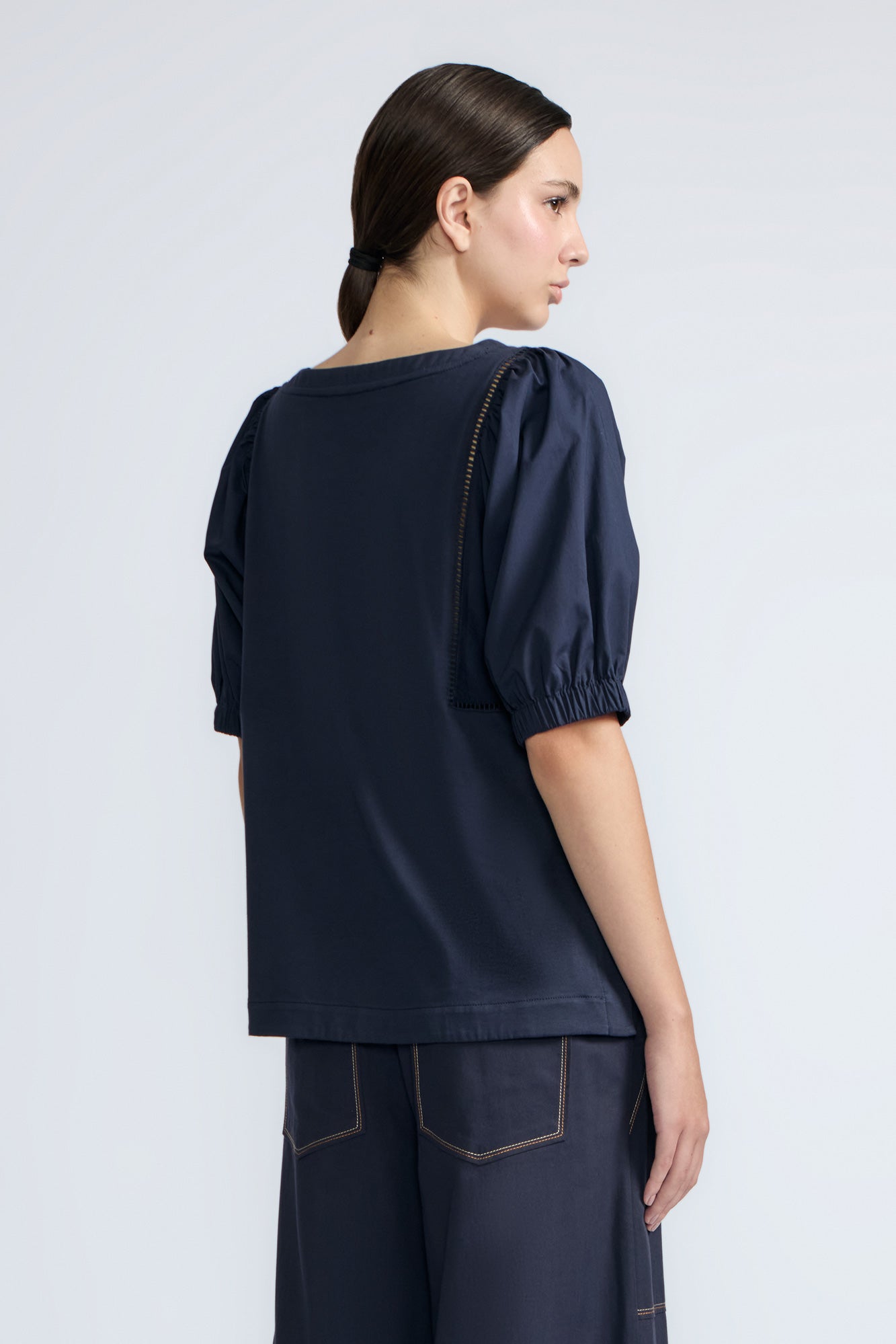 Jamie Top in Navy – 100% cotton top with textured fabric, round neckline, and ¾ sleeves with elastic cuffs.
