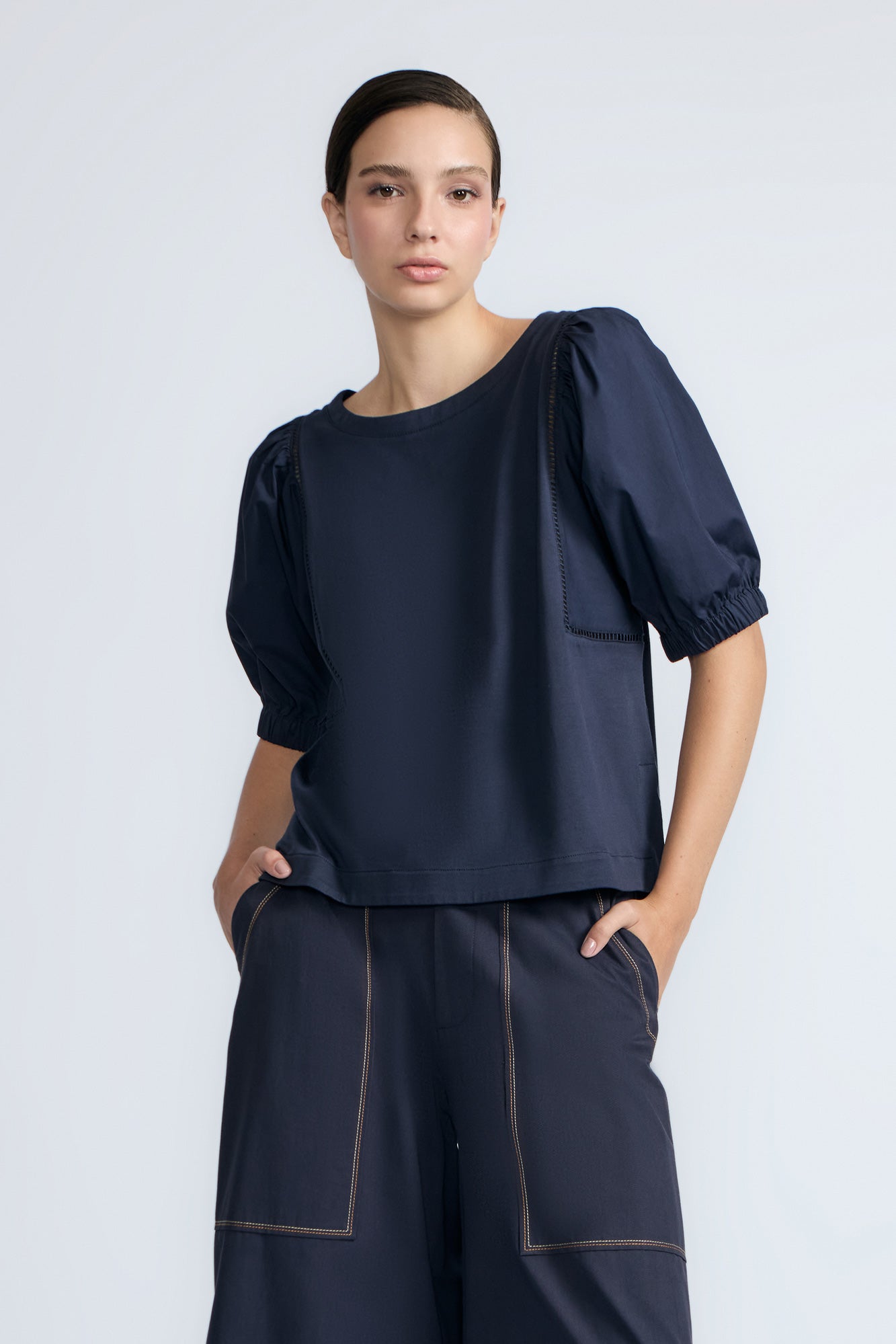 Jamie Top in Navy – 100% cotton top with textured fabric, round neckline, and ¾ sleeves with elastic cuffs.