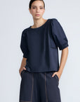 Jamie Top in Navy – 100% cotton top with textured fabric, round neckline, and ¾ sleeves with elastic cuffs.