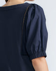 Jamie Top in Navy – 100% cotton top with textured fabric, round neckline, and ¾ sleeves with elastic cuffs.