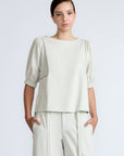 Jamie Top in Silver – 100% cotton blouse with mixed textures, round neckline, and ¾ sleeves with elasticated cuffs.