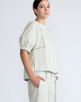 Jamie Top in Silver – 100% cotton blouse with mixed textures, round neckline, and ¾ sleeves with elasticated cuffs.