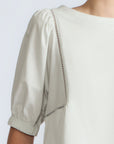 Jamie Top in Silver – 100% cotton blouse with mixed textures, round neckline, and ¾ sleeves with elasticated cuffs.