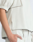 Jamie Top in Silver – 100% cotton blouse with mixed textures, round neckline, and ¾ sleeves with elasticated cuffs.