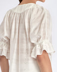 Elegant back view of the Lauren Blouse in Off White.